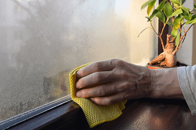 dirty window being cleaned