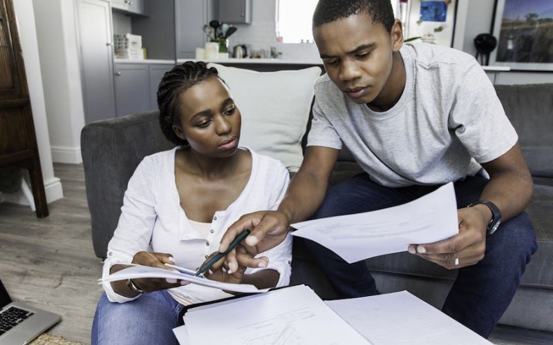 Couple Looking Over Bills