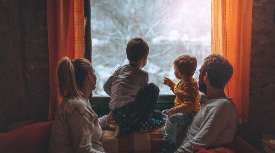 family looking out window
