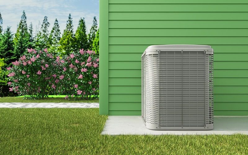 Heat Pump System Installed on Modern Building Exterior.