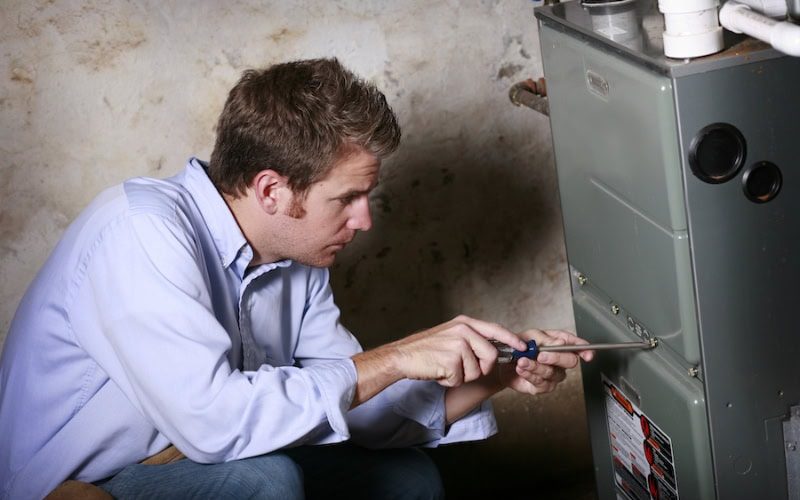 Technician working on unit.