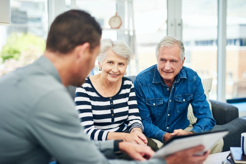 Technician speaking with with customers.